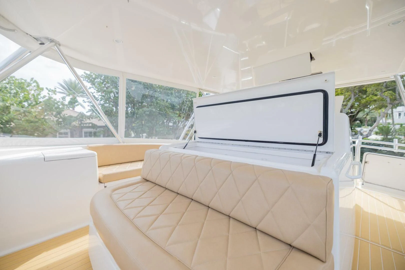 a white couch in a room aboard STABILIZED Yacht for Sale