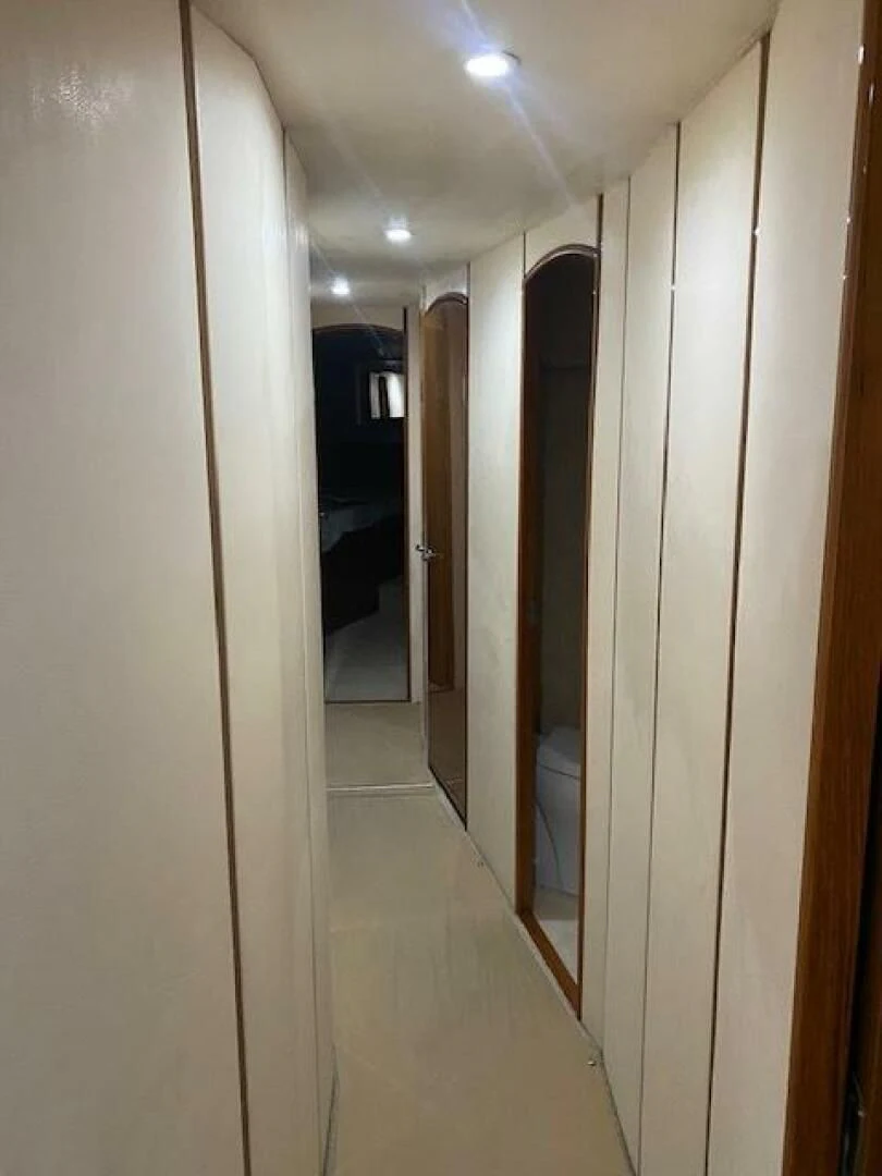 a hallway with doors aboard STABILIZED Yacht for Sale