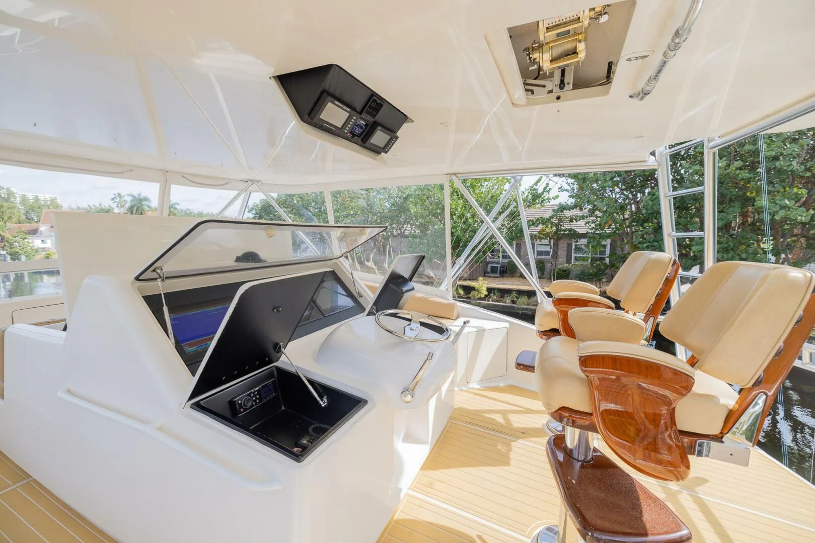 a room with a table and chairs aboard STABILIZED Yacht for Sale