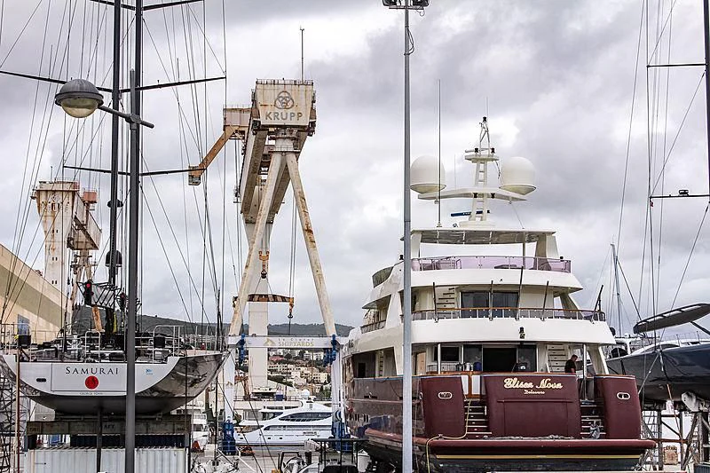 a large ship in a harbor aboard SAMURAI Yacht for Sale