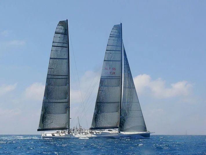 a couple of sailboats on the water aboard SAMURAI Yacht for Sale