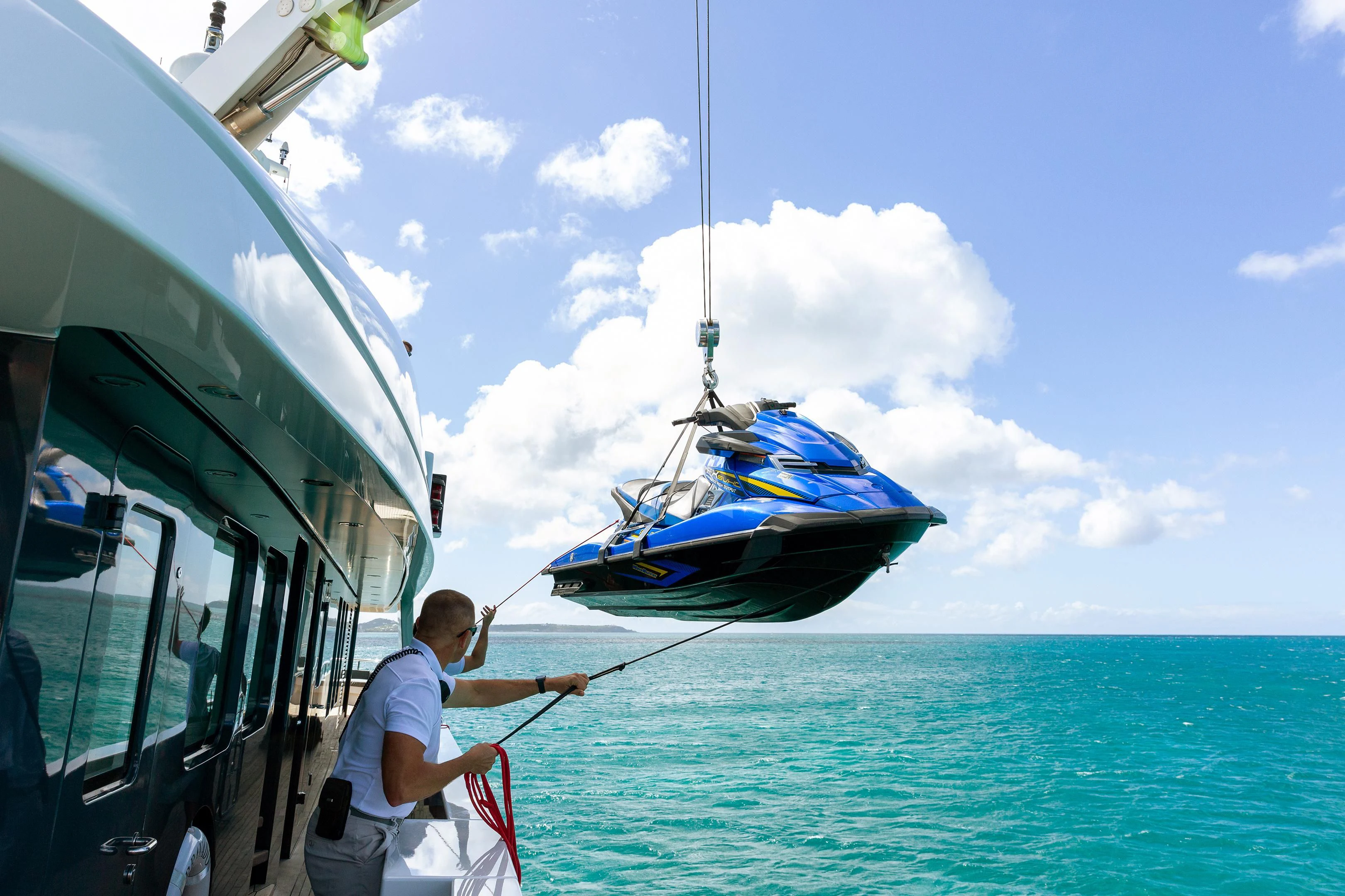 a man on a boat aboard BRAVADO Yacht for Sale