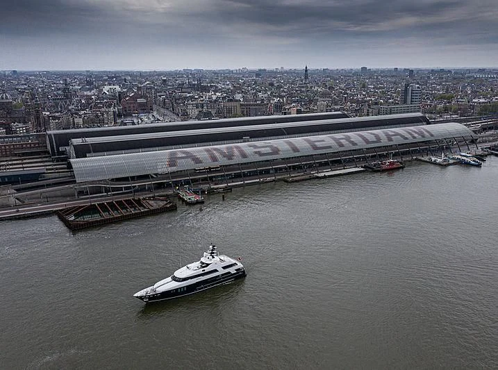a large ship in the water aboard BRAVADO Yacht for Sale