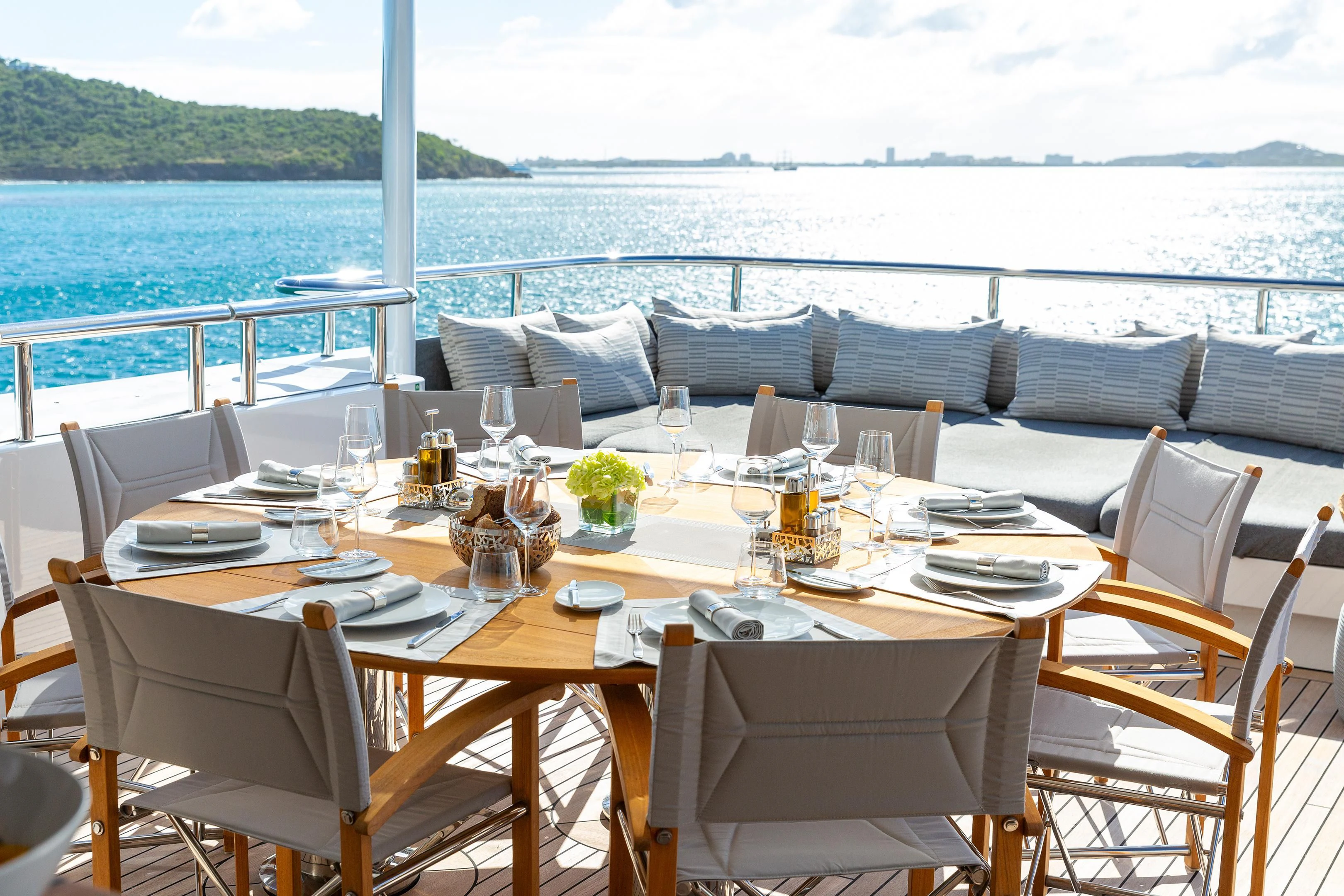 a table set for a dinner party aboard BRAVADO Yacht for Sale