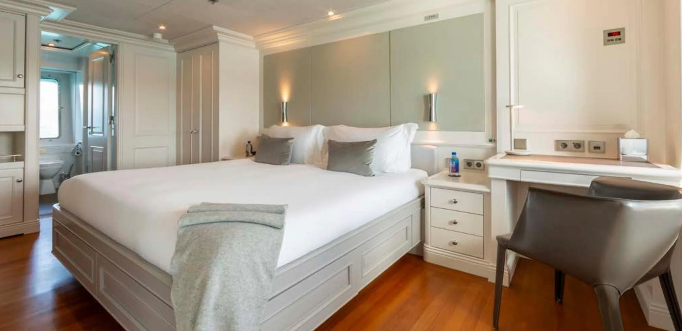 a bed in a room aboard BRAVADO Yacht for Sale