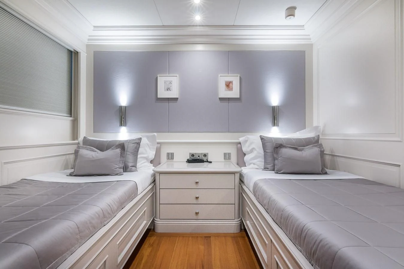 a room with two beds aboard BRAVADO Yacht for Sale