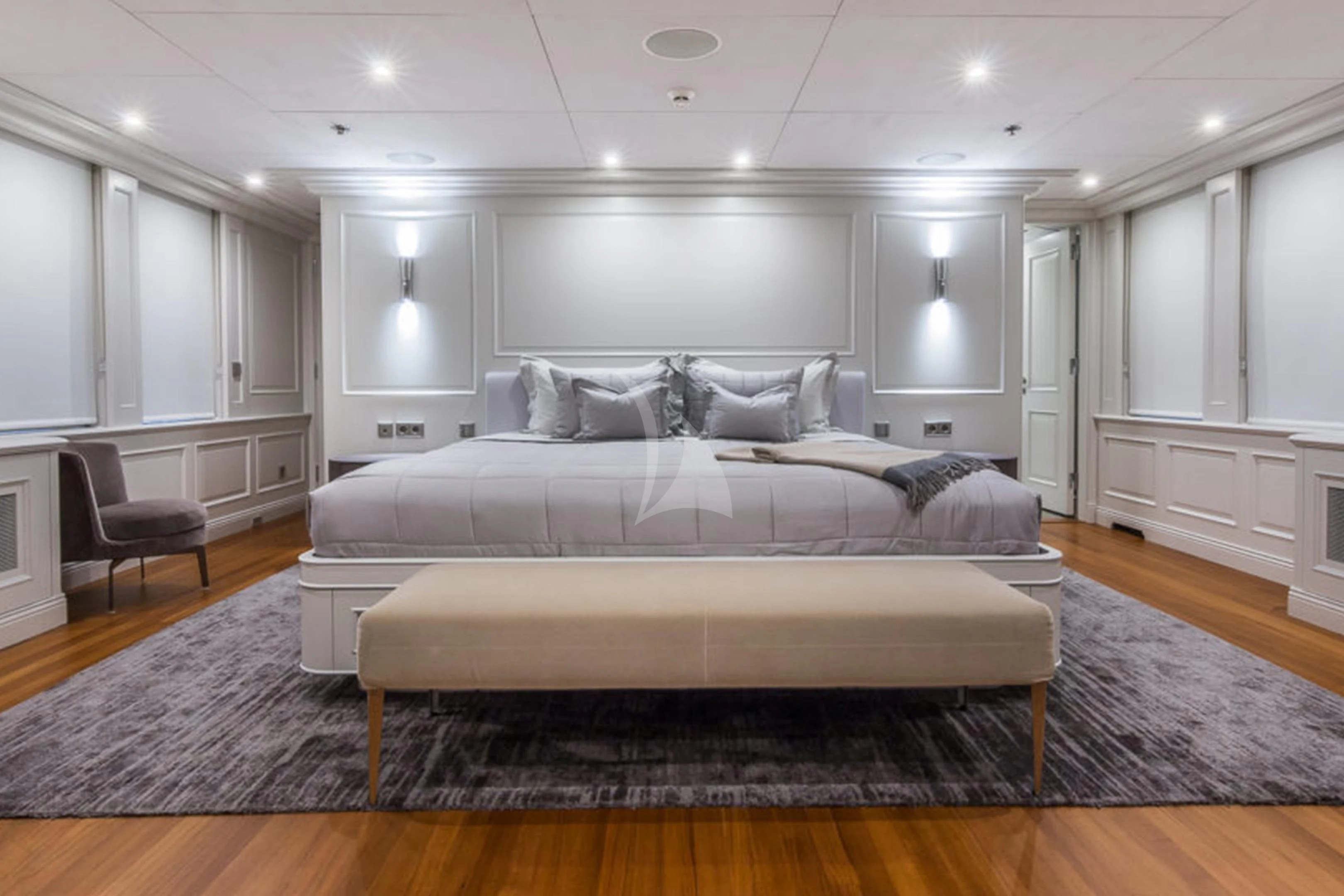 a large bed in a room aboard BRAVADO Yacht for Sale