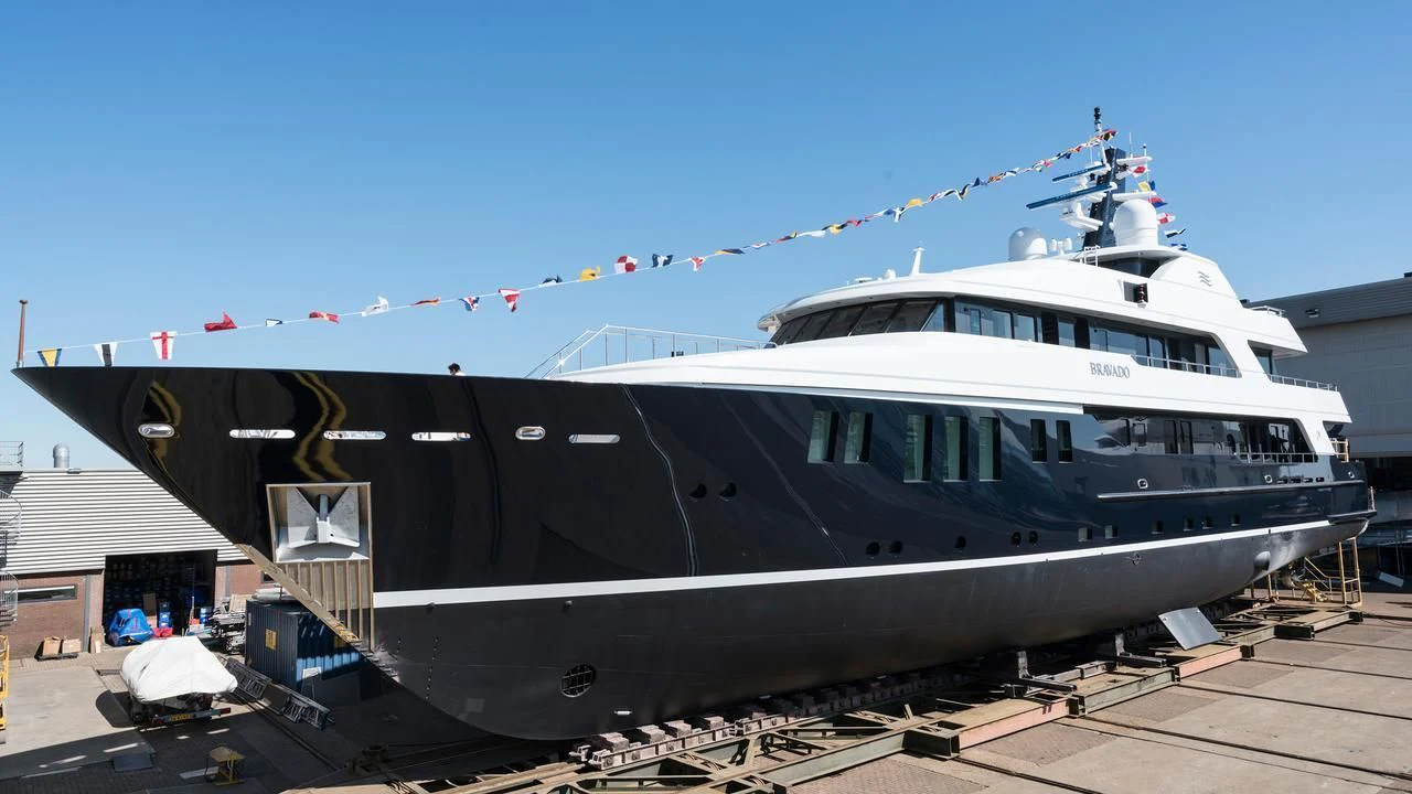 a large ship docked aboard BRAVADO Yacht for Sale