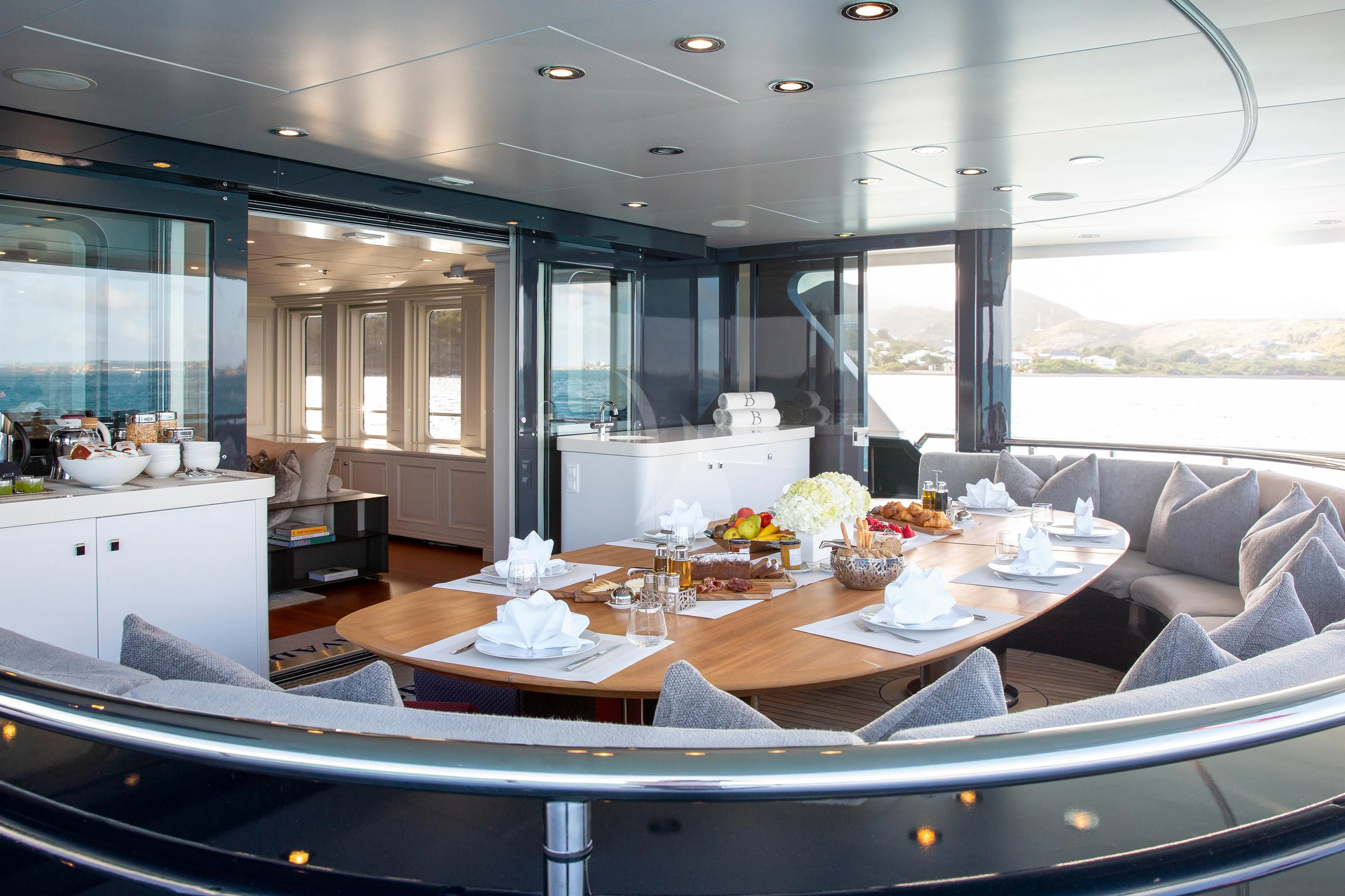 a large kitchen with a large window aboard BRAVADO Yacht for Sale