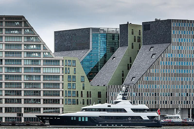 a building with a train in front aboard BRAVADO Yacht for Sale