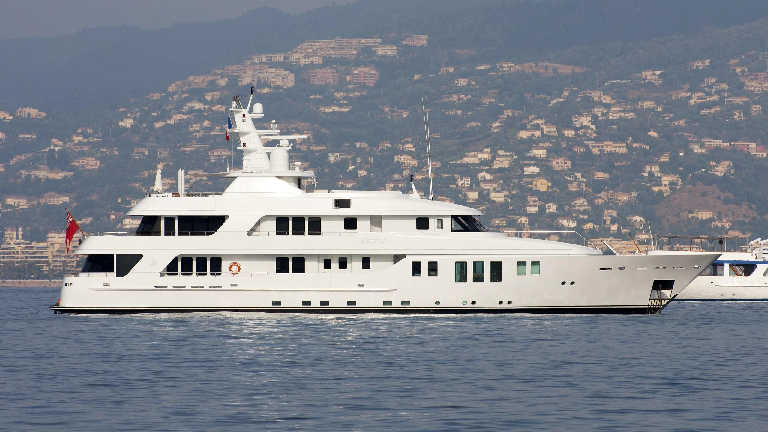 a large white yacht aboard BRAVADO Yacht for Sale
