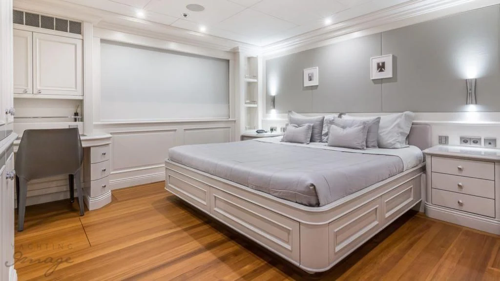 a large bed in a room aboard BRAVADO Yacht for Sale