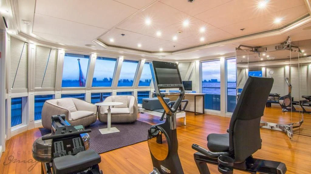 a gym with exercise equipment aboard BRAVADO Yacht for Sale