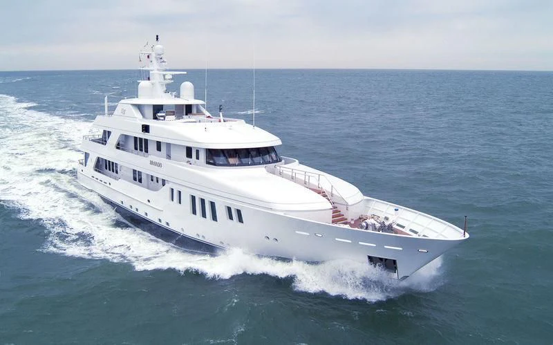 a large white boat on the water aboard BRAVADO Yacht for Sale