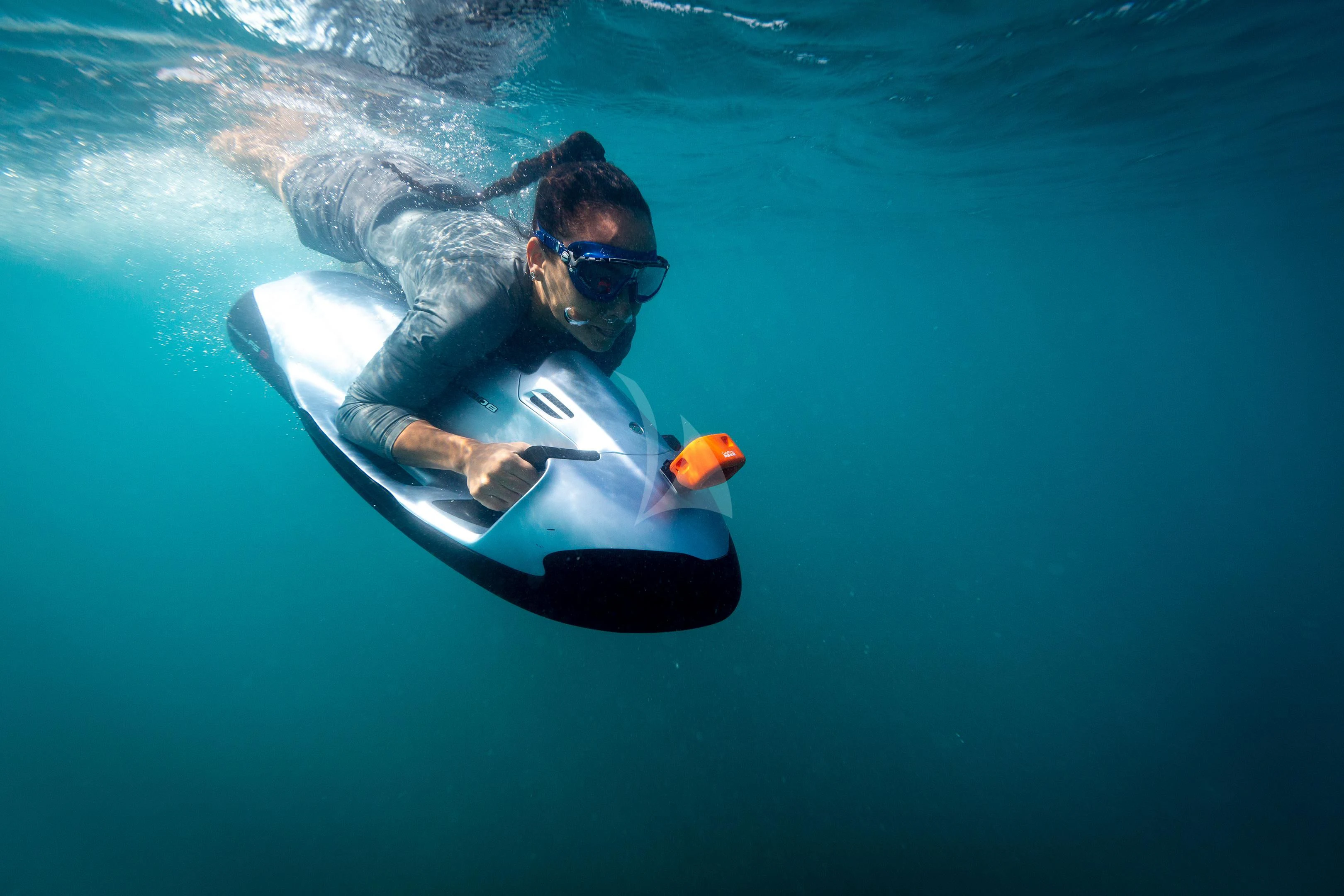 a man in a goggles in a pool aboard BRAVADO Yacht for Sale