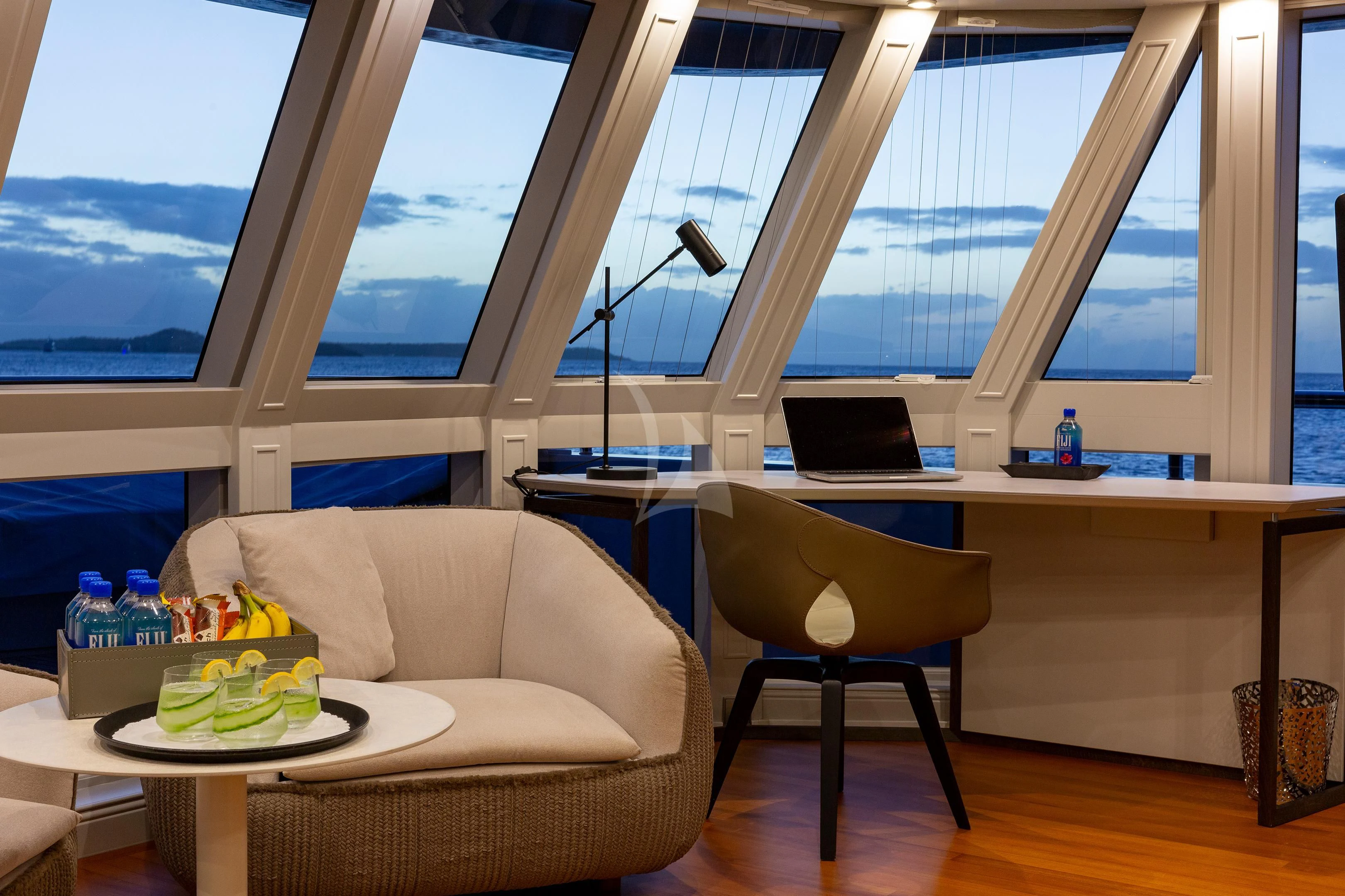a room with a table and a laptop aboard BRAVADO Yacht for Sale