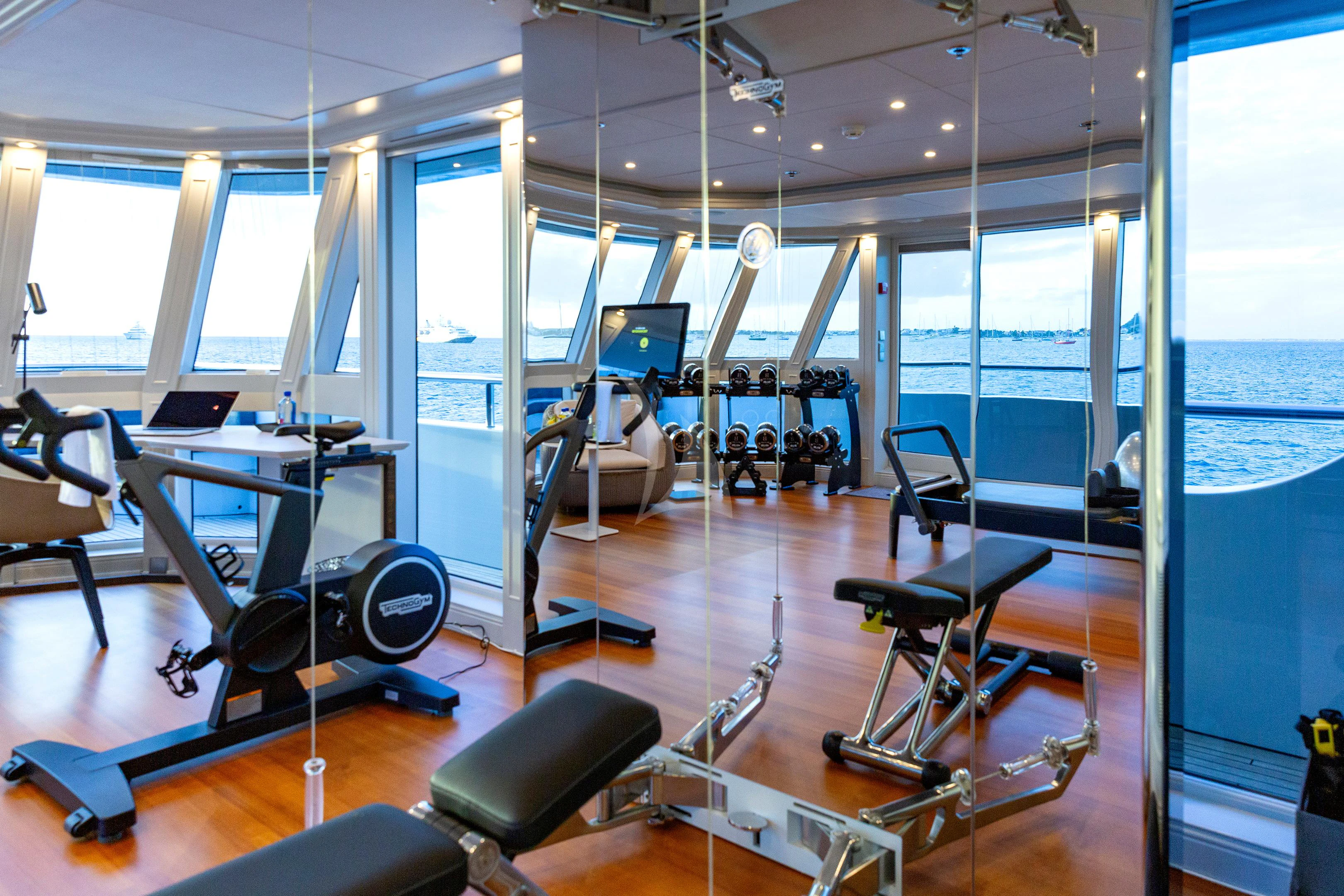 exercise equipment in a room aboard BRAVADO Yacht for Sale