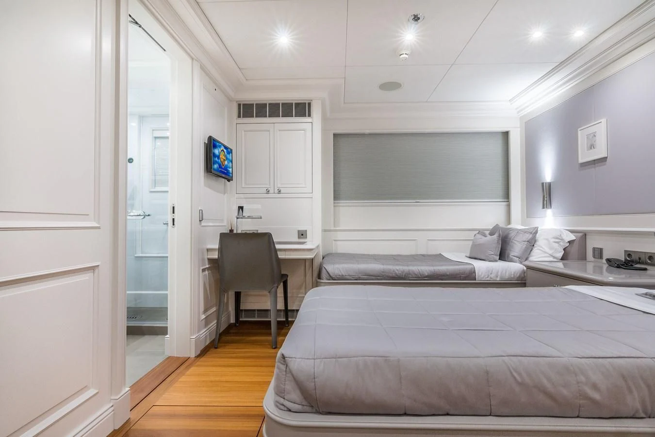 a large bed in a room aboard BRAVADO Yacht for Sale