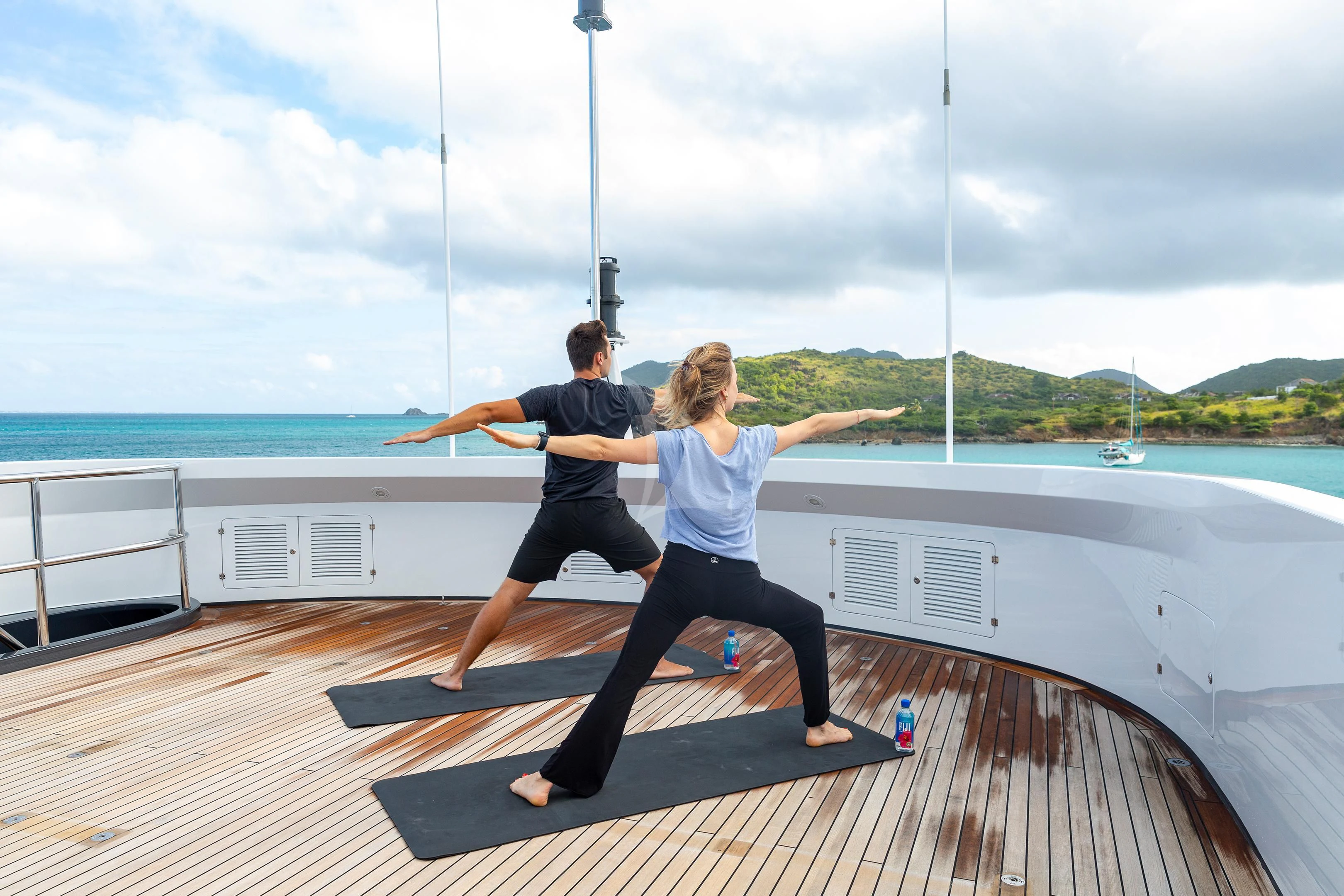 a couple of people on a dock aboard BRAVADO Yacht for Sale
