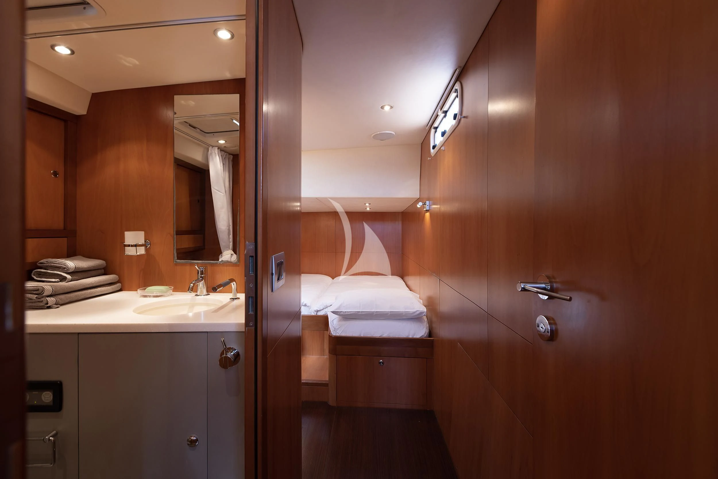 a bathroom with a sink and a mirror aboard MELITI Yacht for Sale