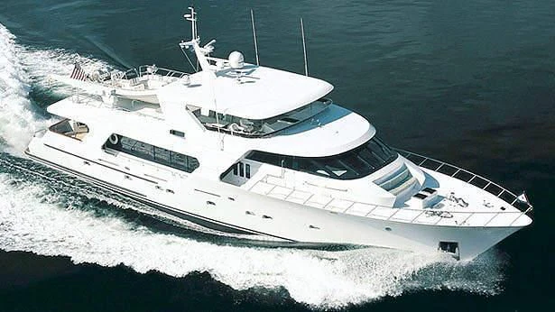 a white yacht on the water aboard REFLECTIONS Yacht for Sale