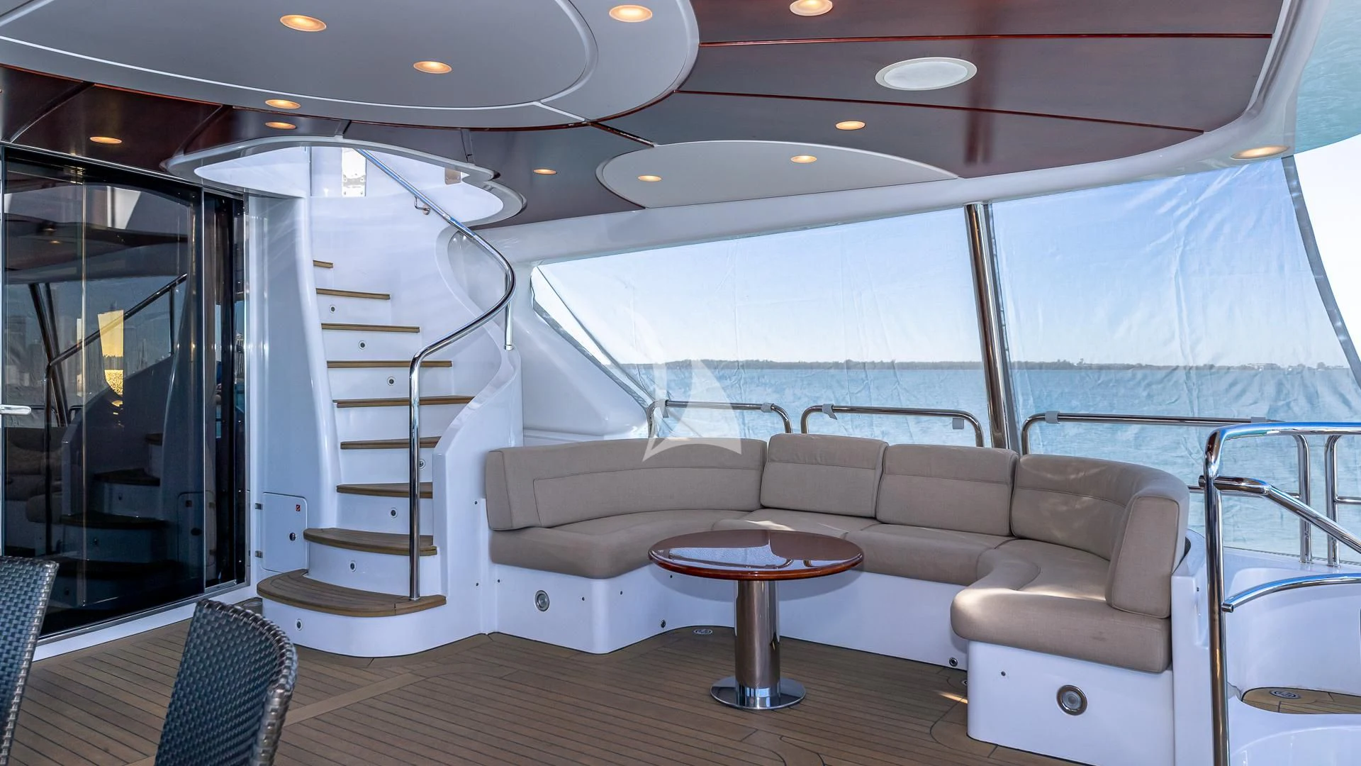 a living room with a large glass window aboard VIRTUE Yacht for Sale