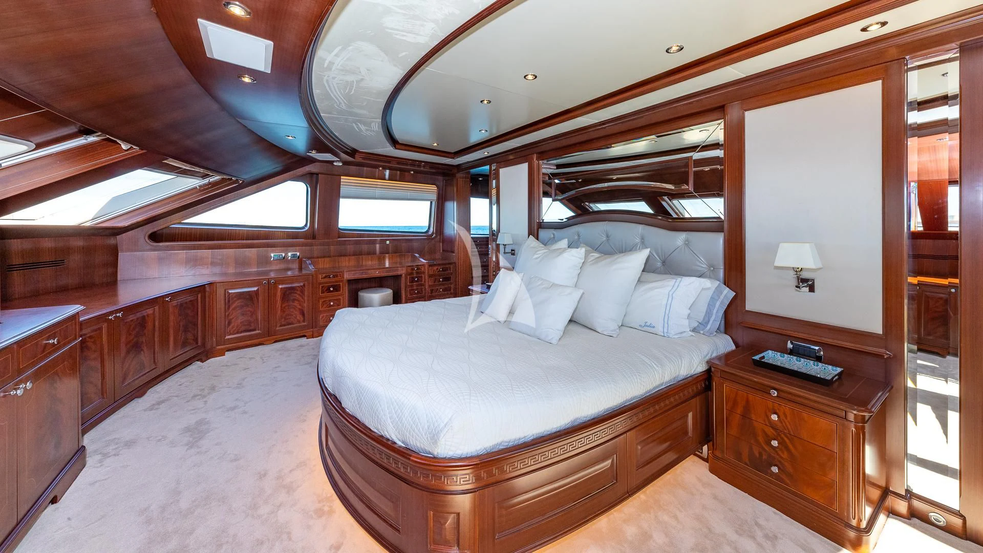 a large bedroom with a bed aboard VIRTUE Yacht for Sale