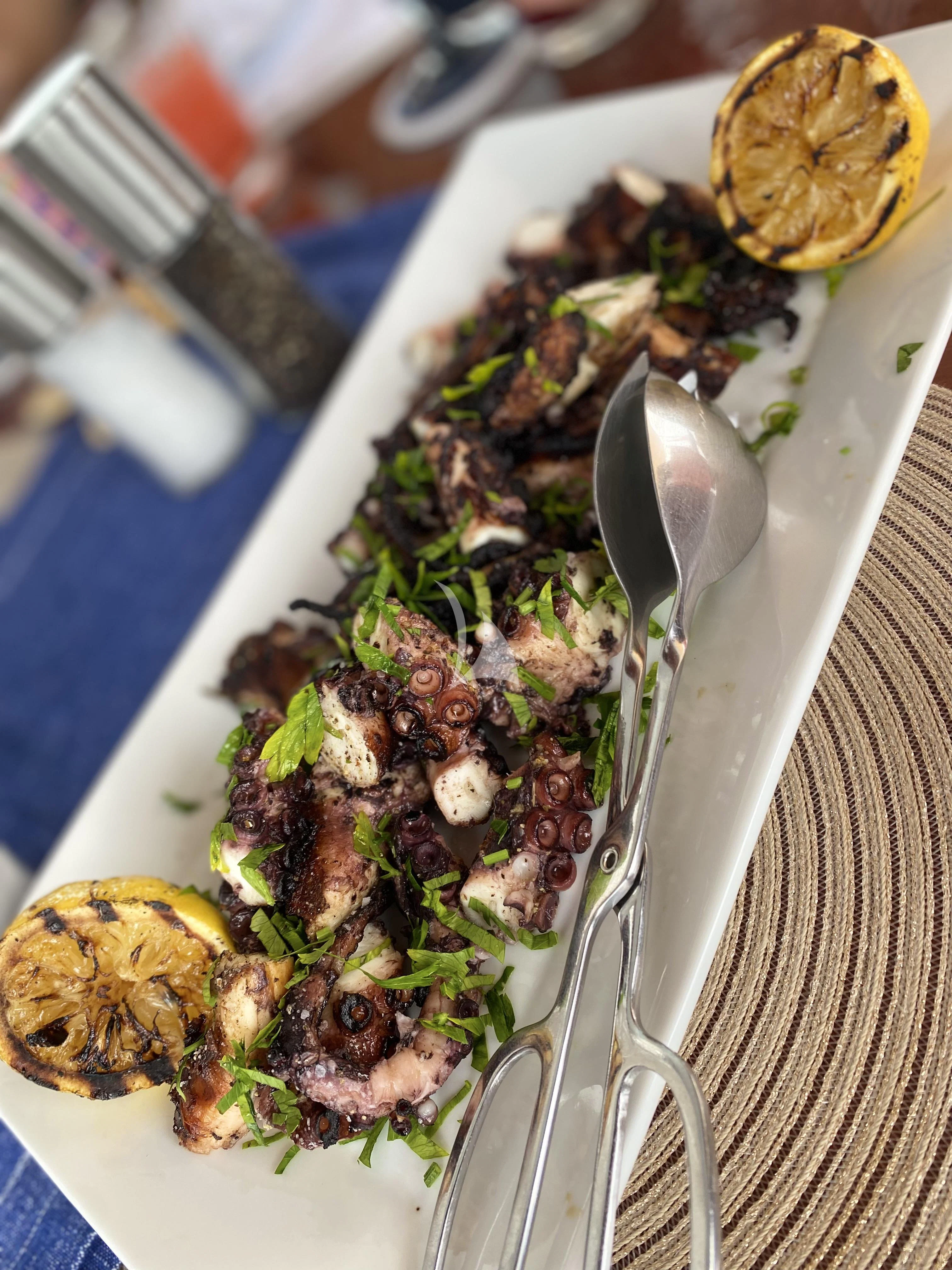 a plate of food aboard VIRTUE Yacht for Sale