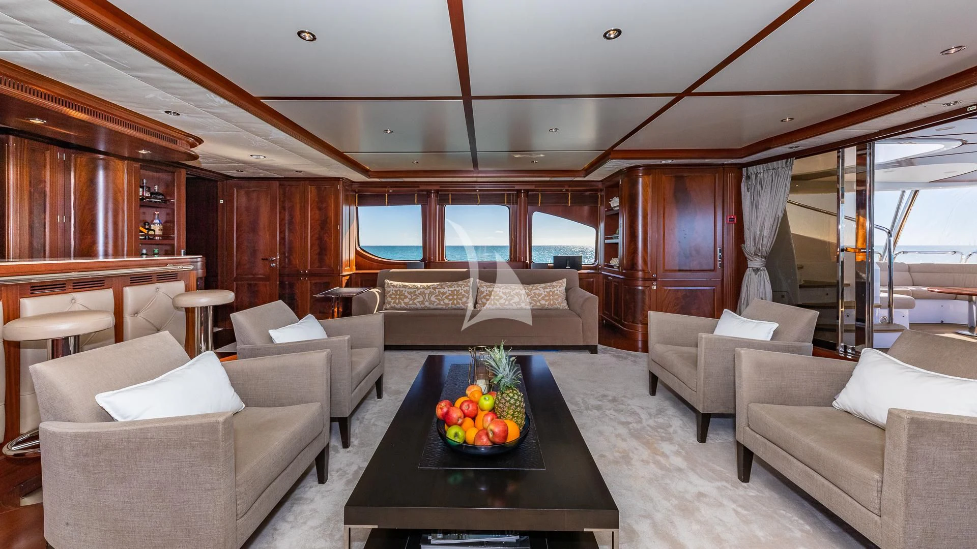 a living room with a large bed aboard VIRTUE Yacht for Sale
