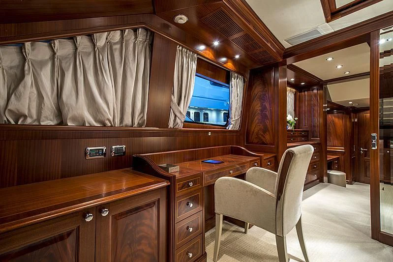 a room with a desk and a chair aboard VIRTUE Yacht for Sale