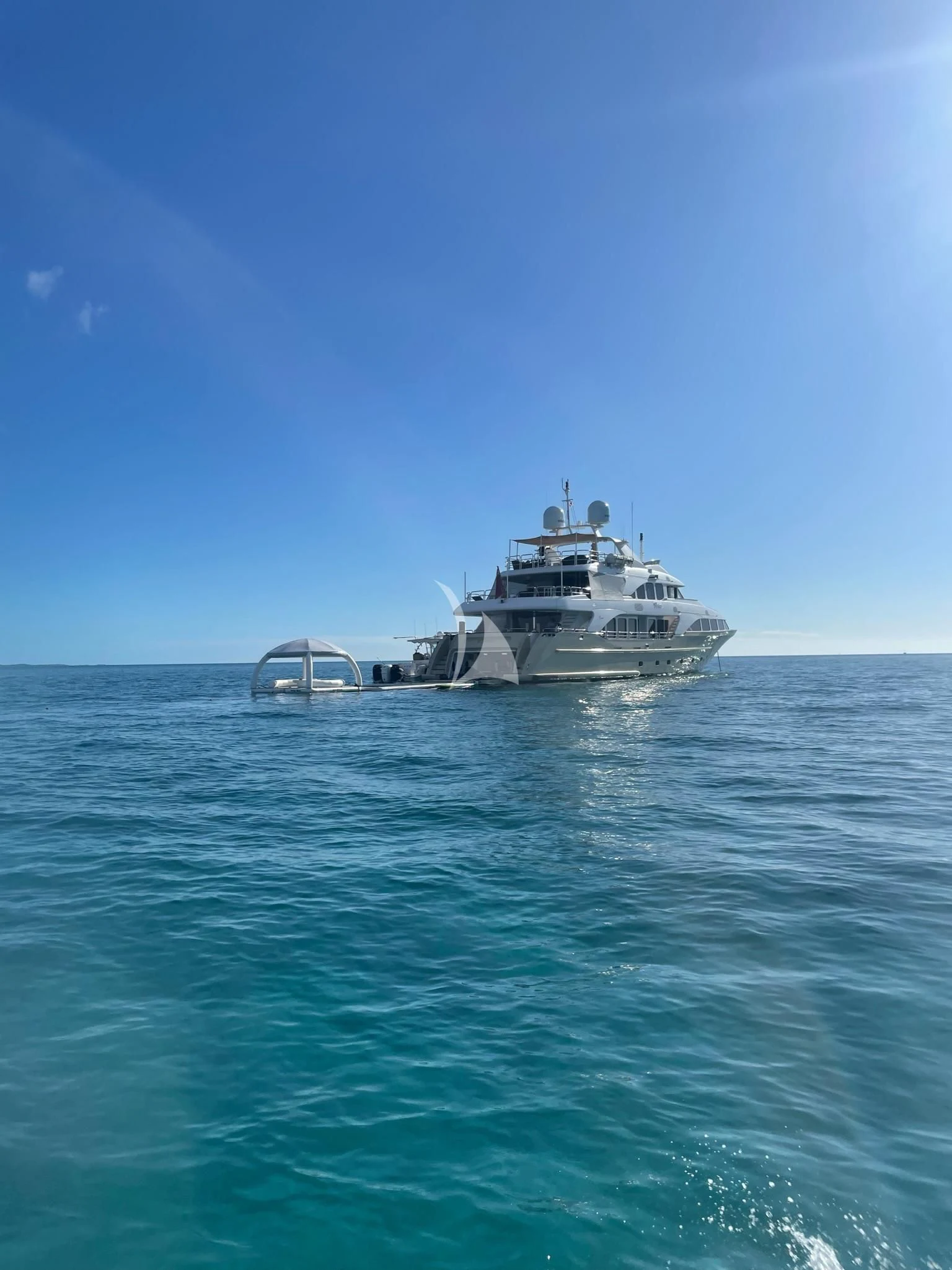 a large ship in the water aboard VIRTUE Yacht for Sale