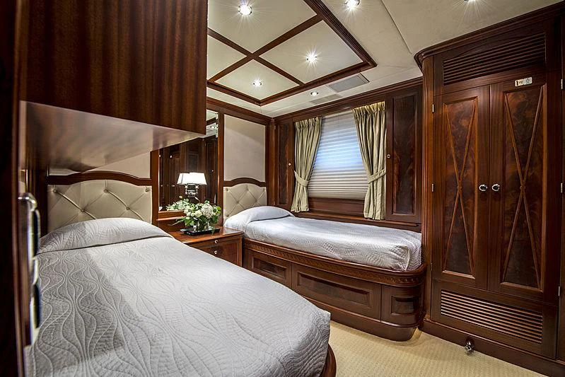 a room with two beds aboard VIRTUE Yacht for Sale