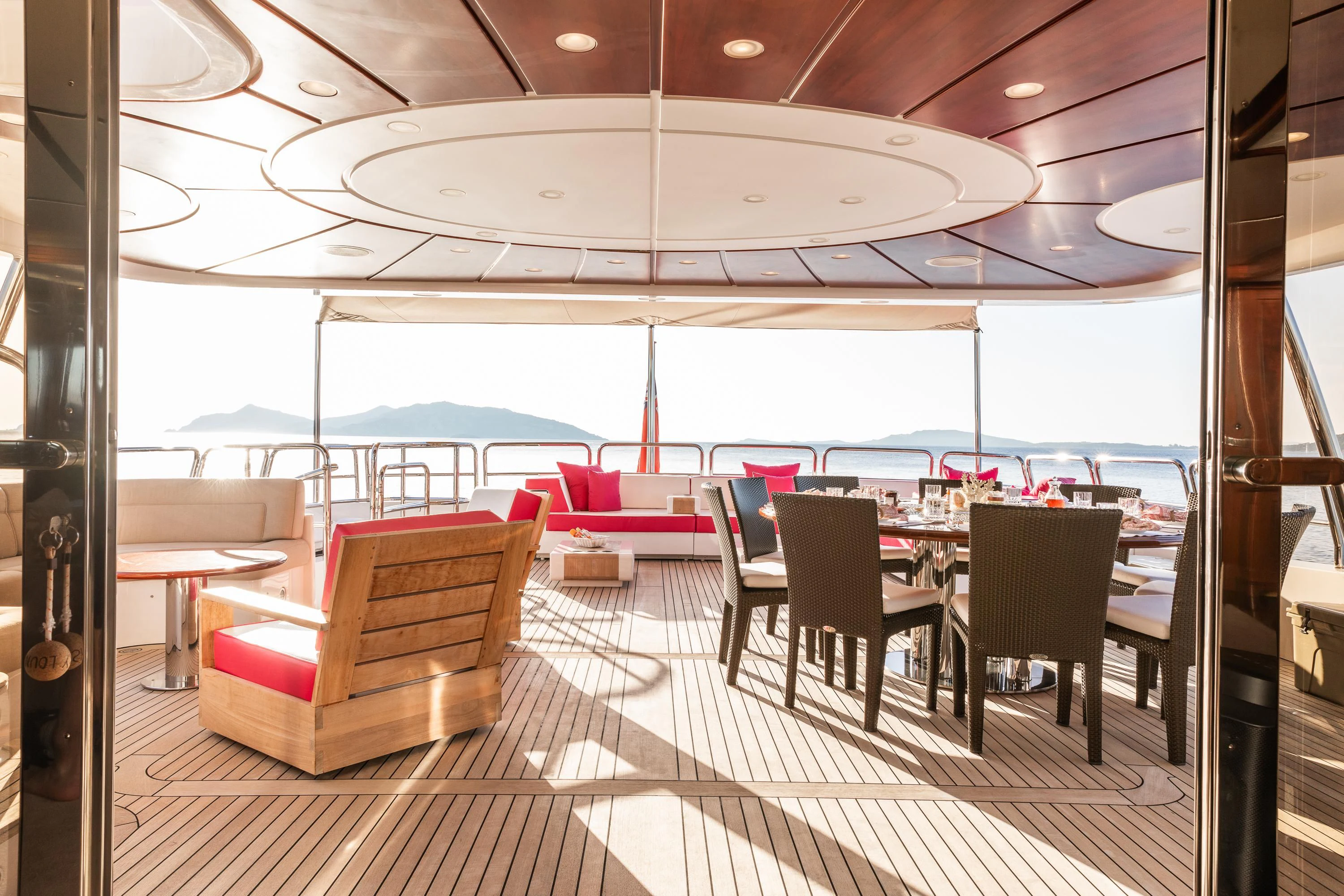 a room with a table and chairs aboard VIRTUE Yacht for Sale