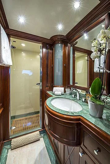 a bathroom with a sink and a shower aboard VIRTUE Yacht for Sale