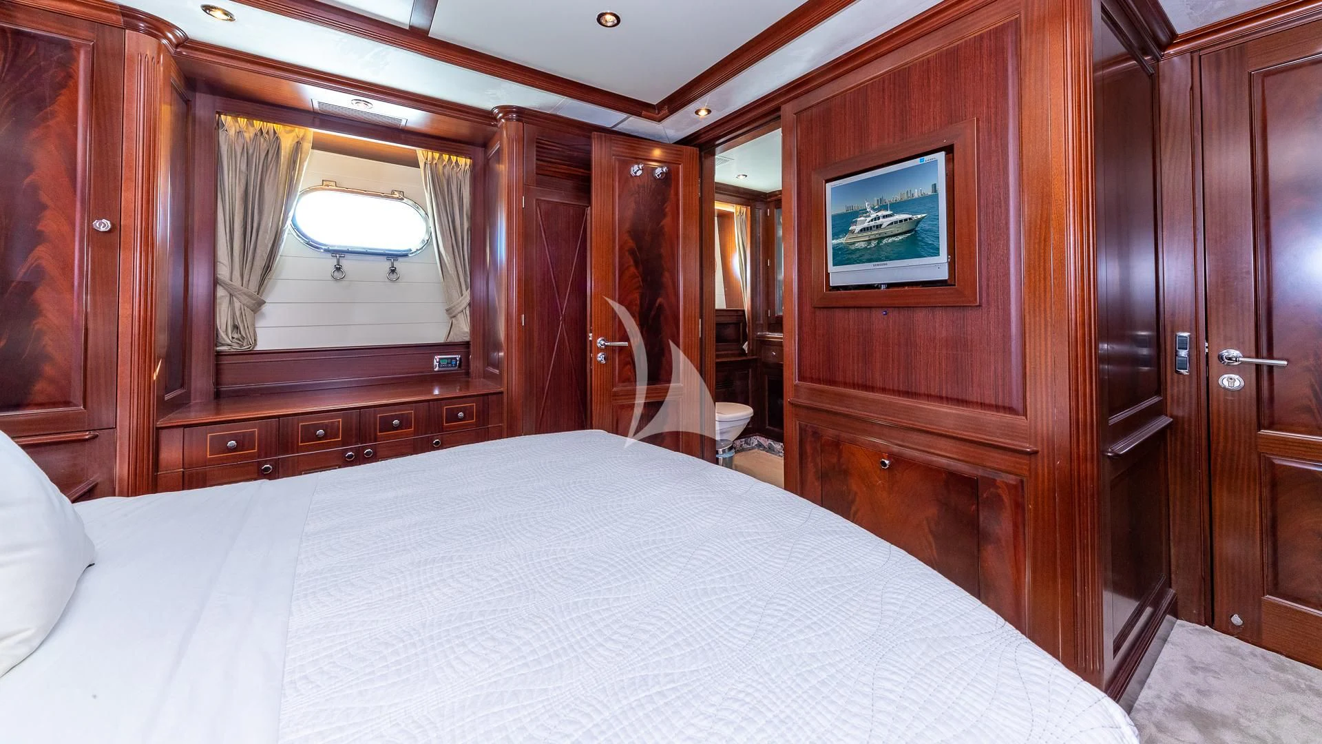 a bed in a room aboard VIRTUE Yacht for Sale