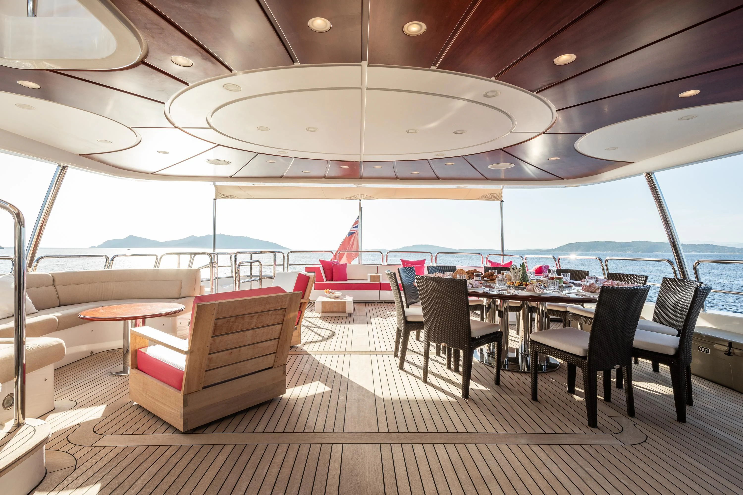 a room with a table and chairs aboard VIRTUE Yacht for Sale
