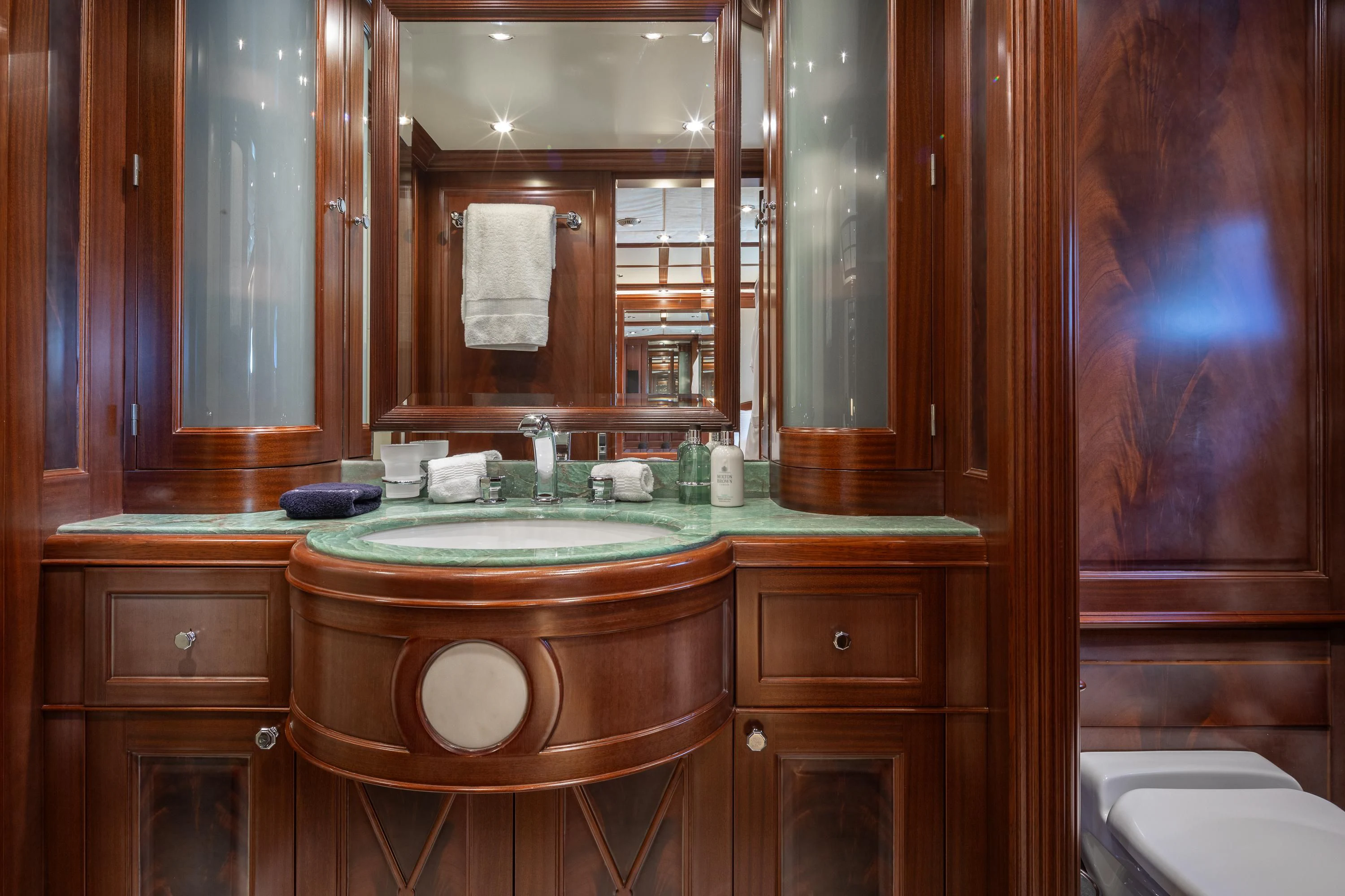 a bathroom with a sink and toilet aboard VIRTUE Yacht for Sale
