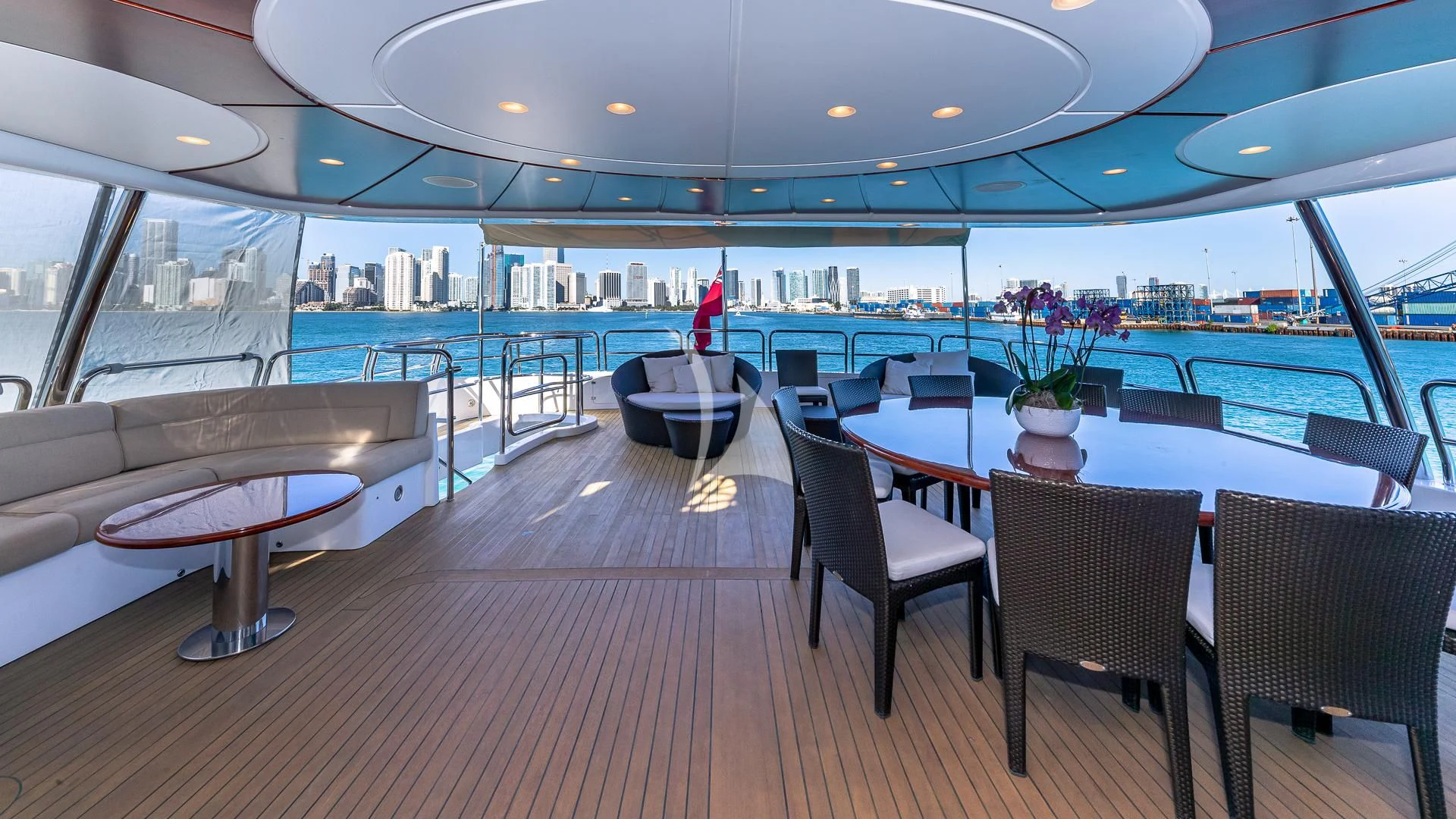 a room with a table and chairs aboard VIRTUE Yacht for Sale
