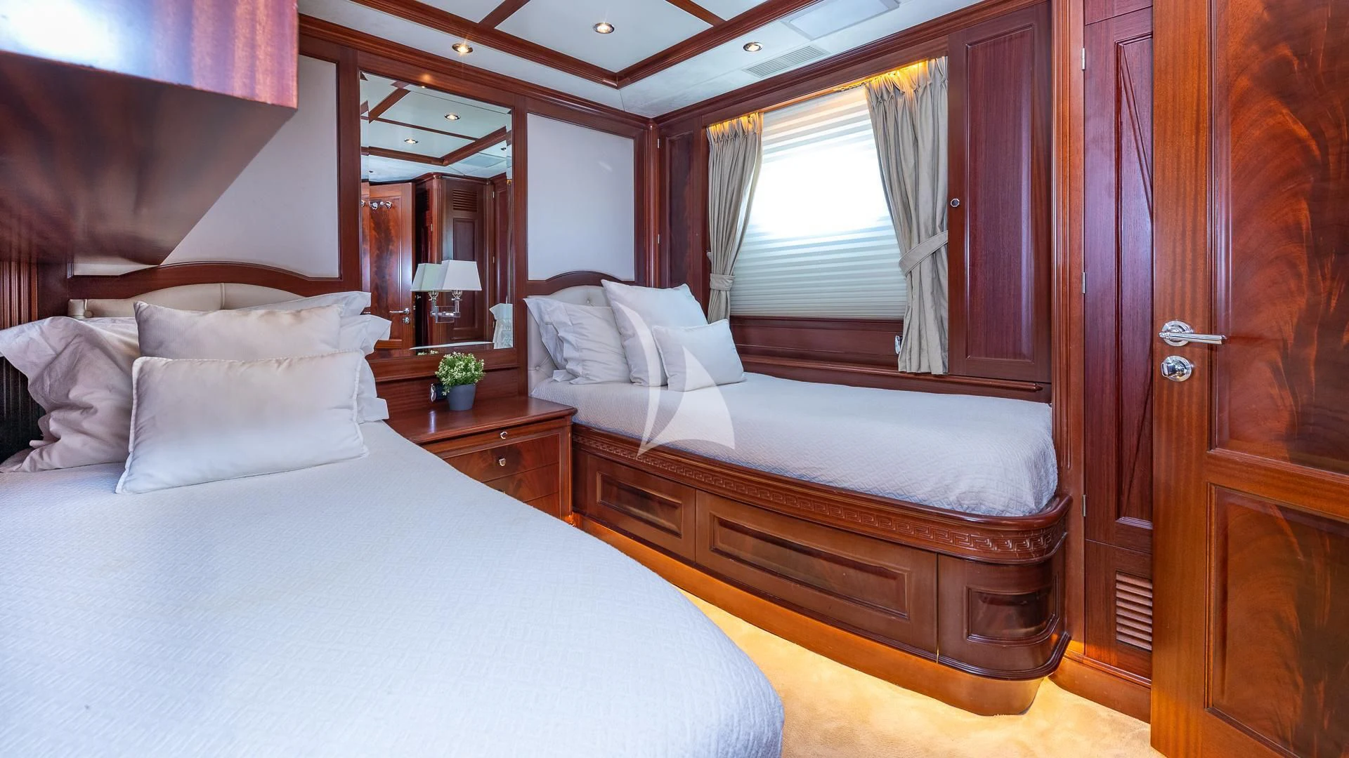 a room with two beds aboard VIRTUE Yacht for Sale