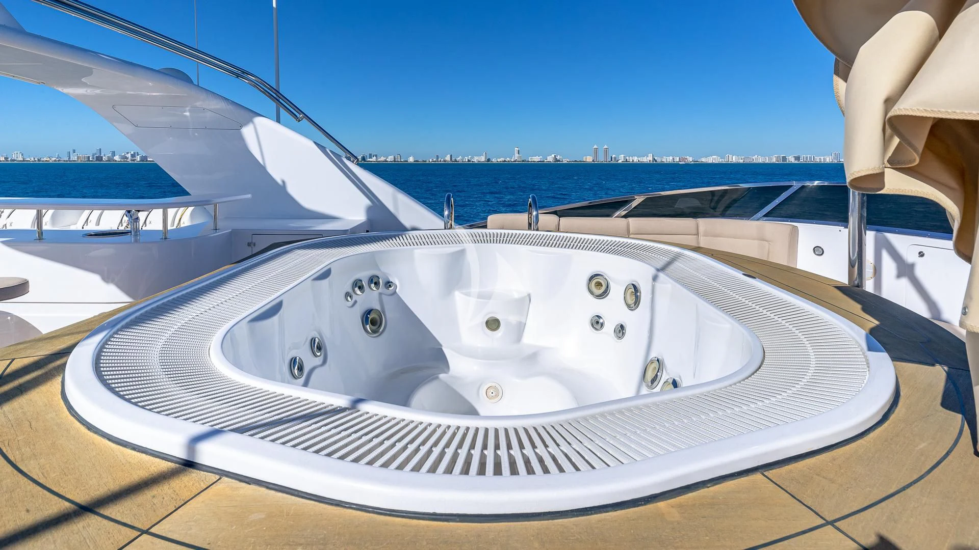 a white car on a deck aboard VIRTUE Yacht for Sale