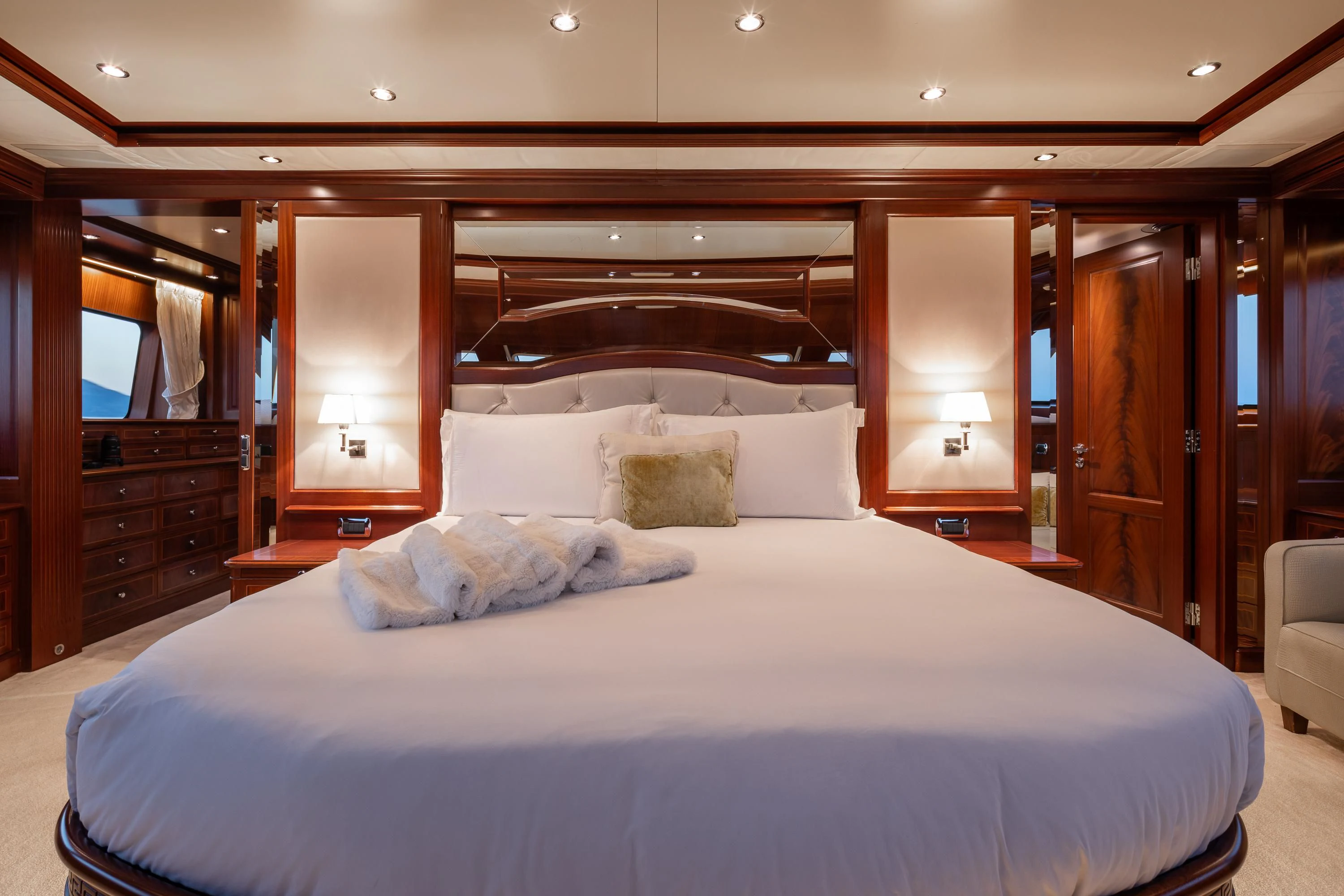 a bed with white sheets aboard VIRTUE Yacht for Sale