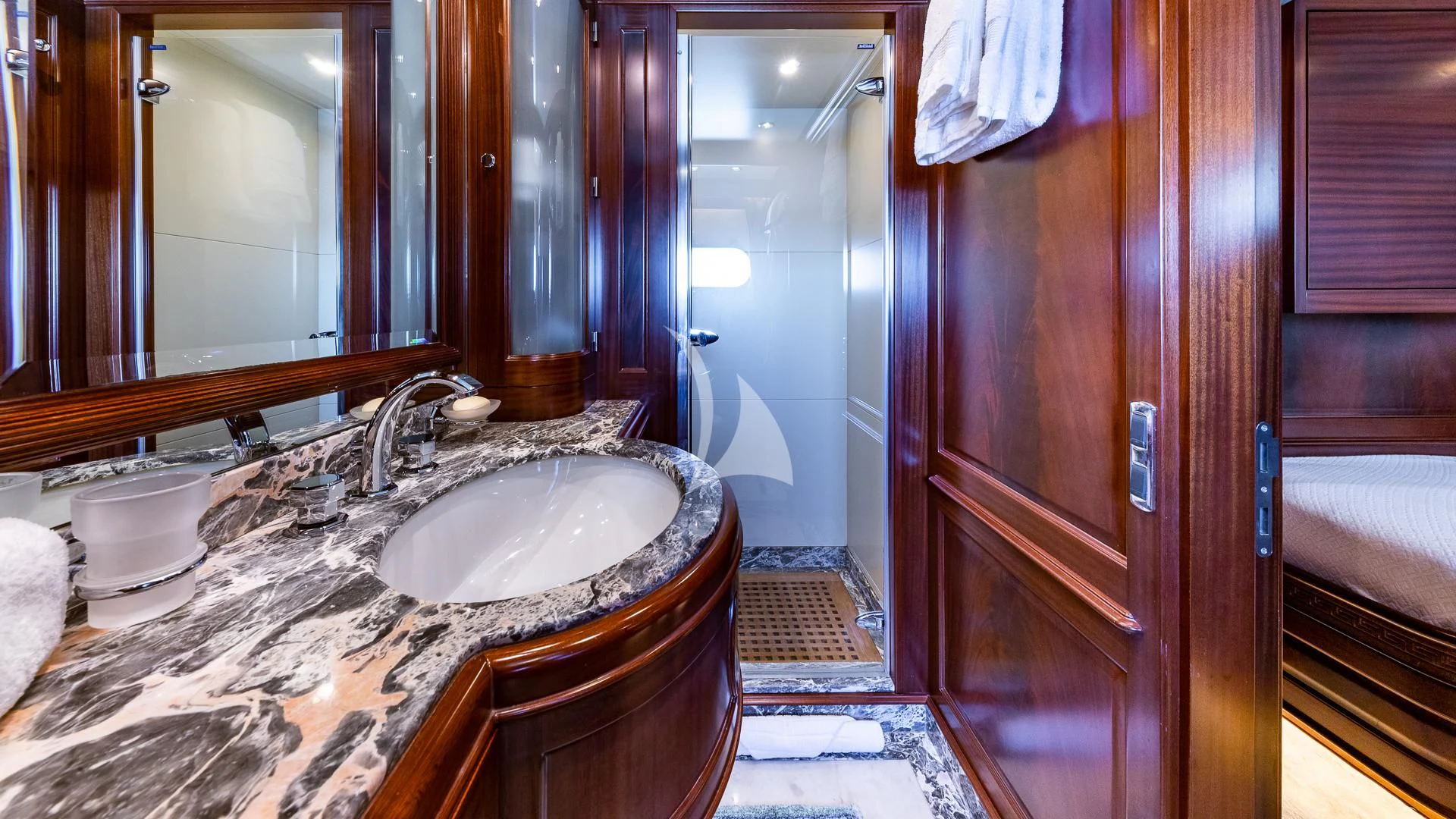 a bathroom with a sink and a shower aboard VIRTUE Yacht for Sale