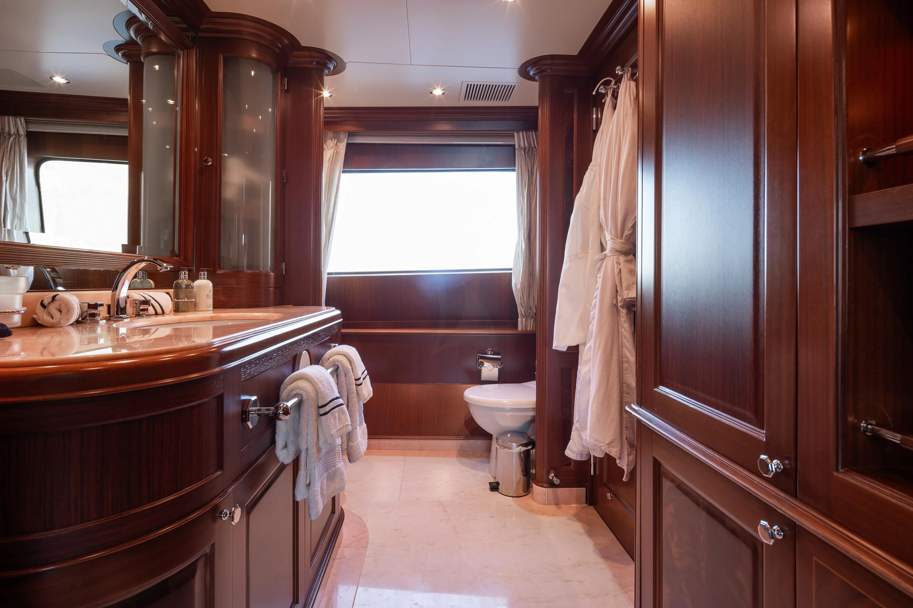 a bathroom with a sink and toilet aboard VIRTUE Yacht for Sale