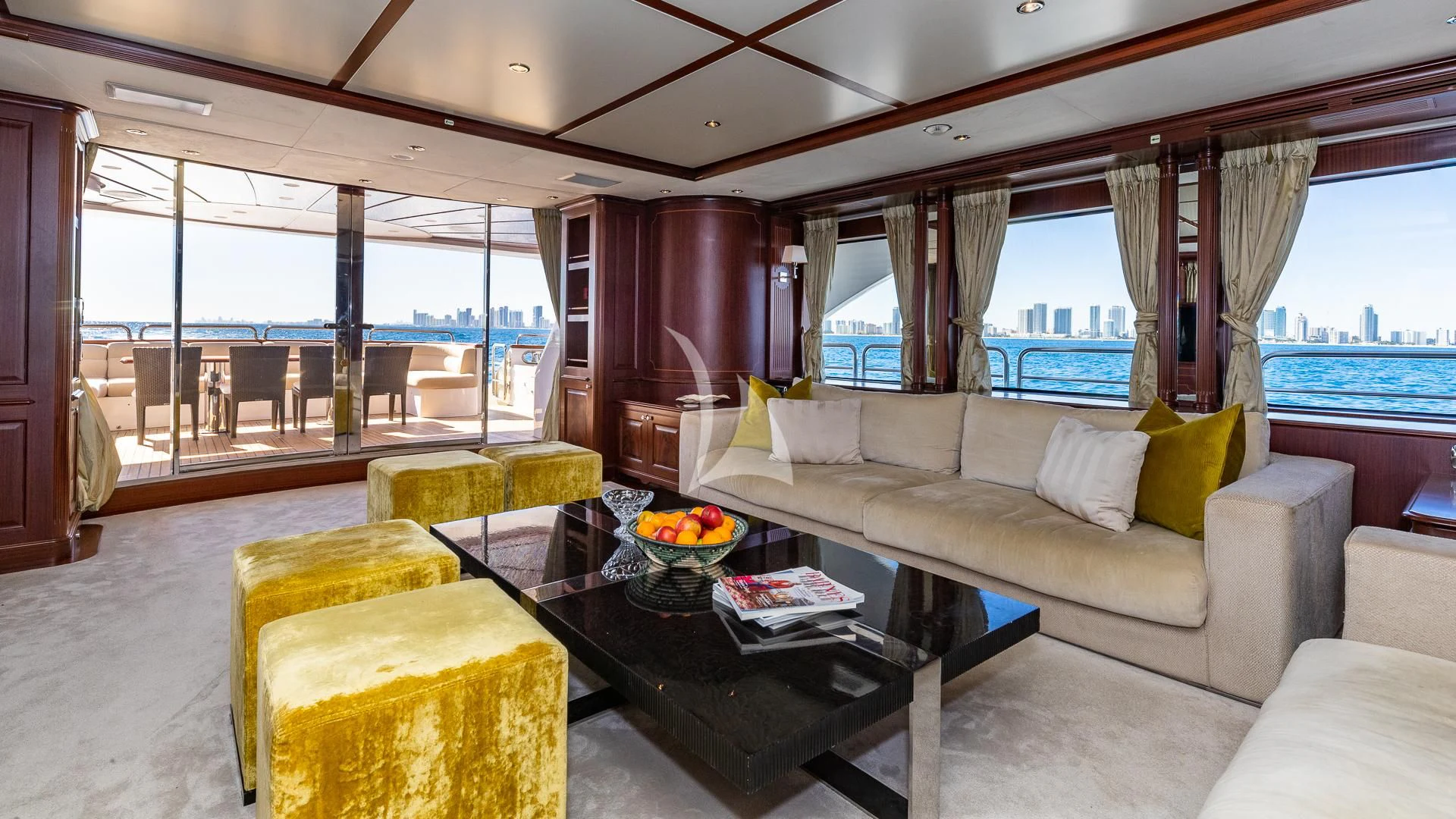 a living room with a large window aboard VIRTUE Yacht for Sale