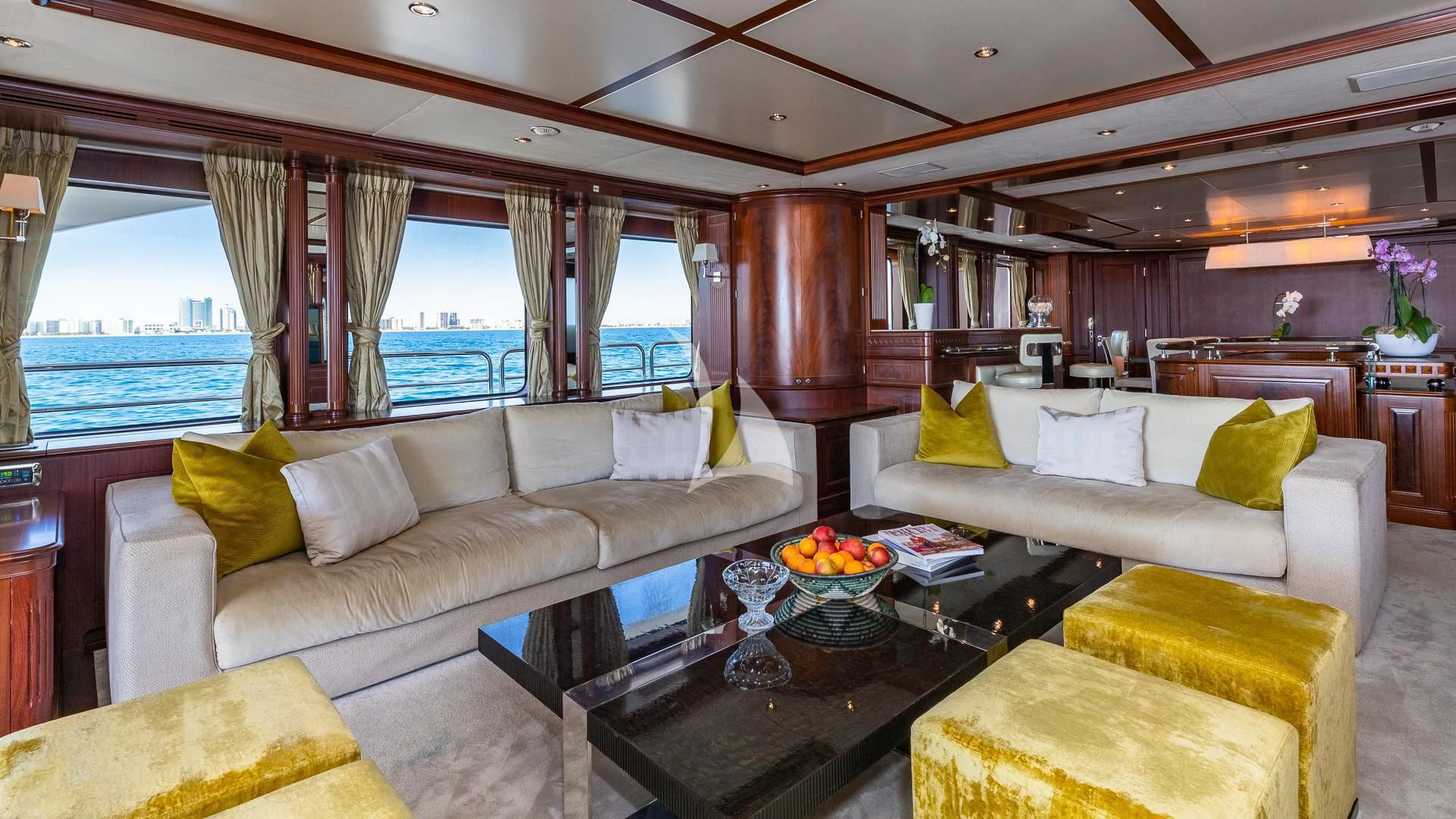 a living room with a large window aboard VIRTUE Yacht for Sale