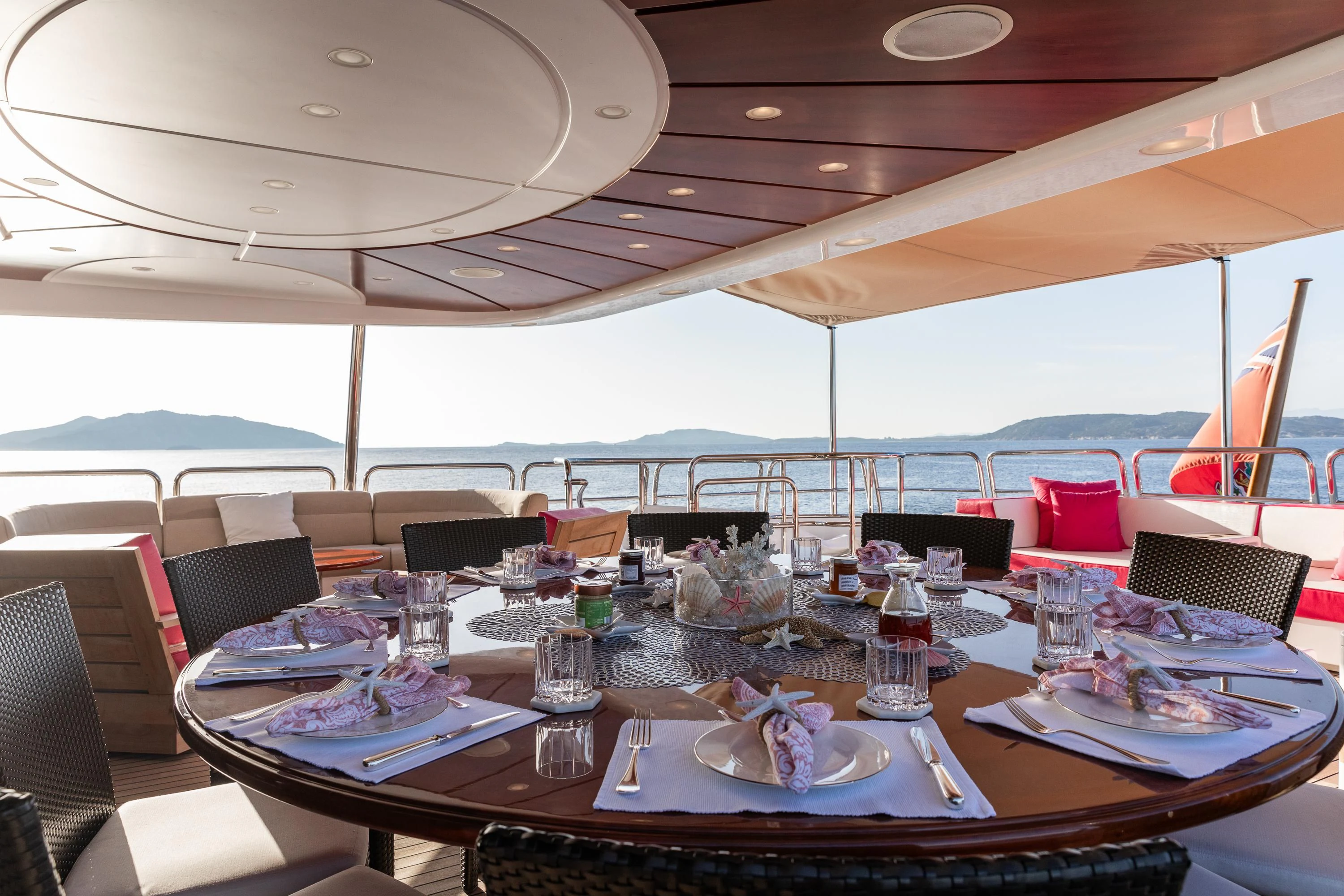 a table set for a dinner aboard VIRTUE Yacht for Sale