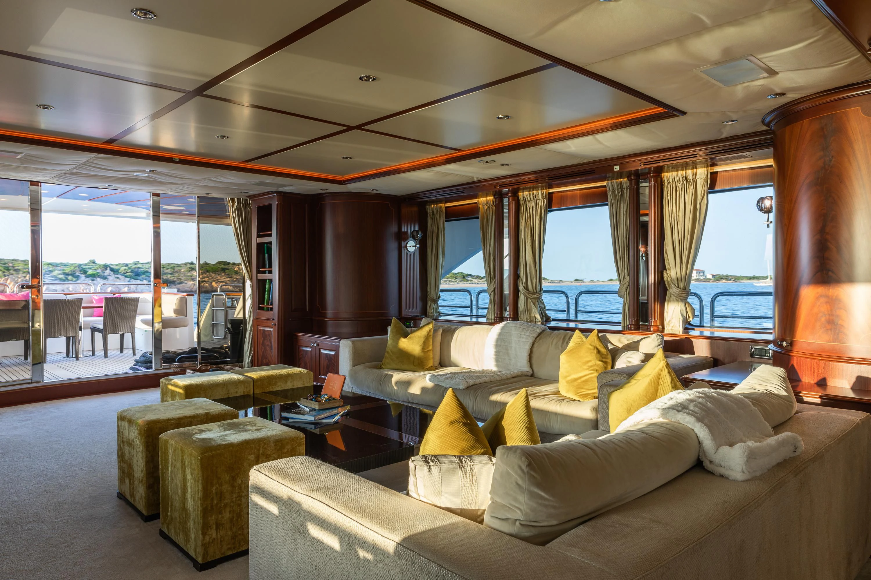 a living room with a large window aboard VIRTUE Yacht for Sale