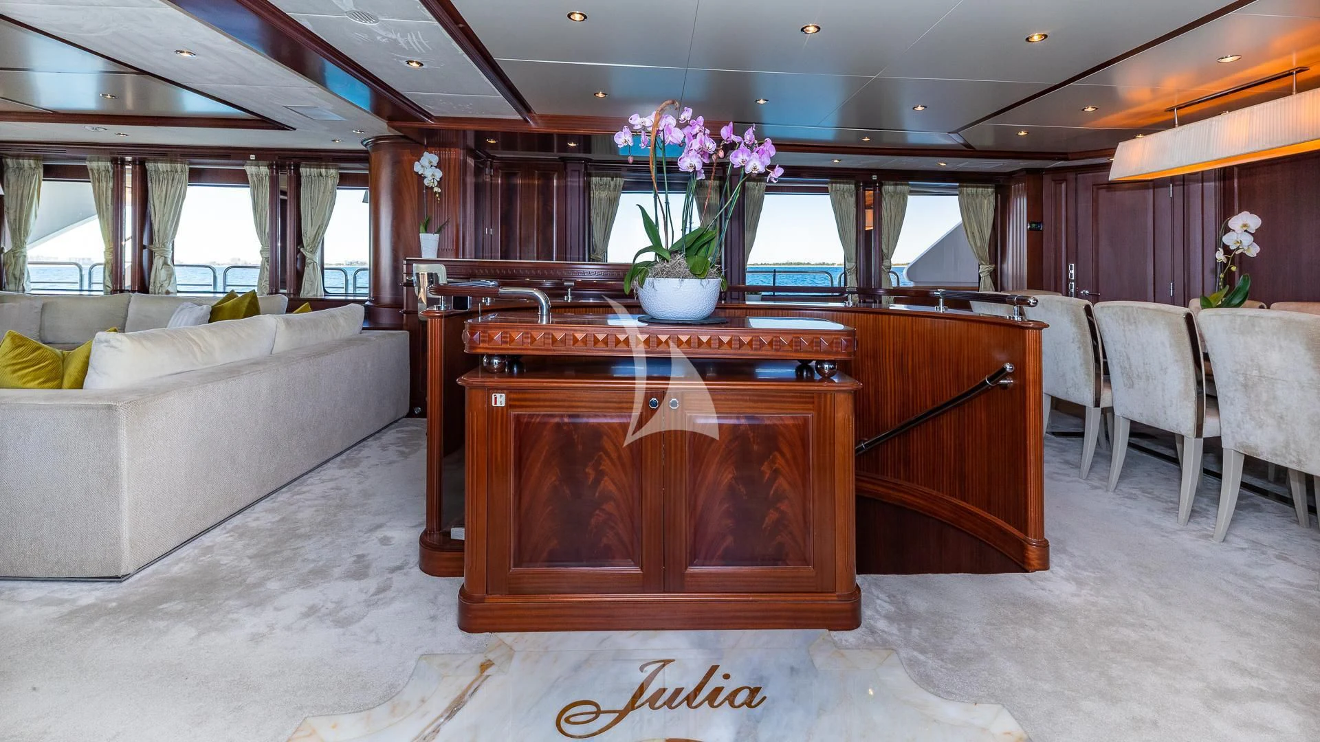a living room with a couch and a table aboard VIRTUE Yacht for Sale