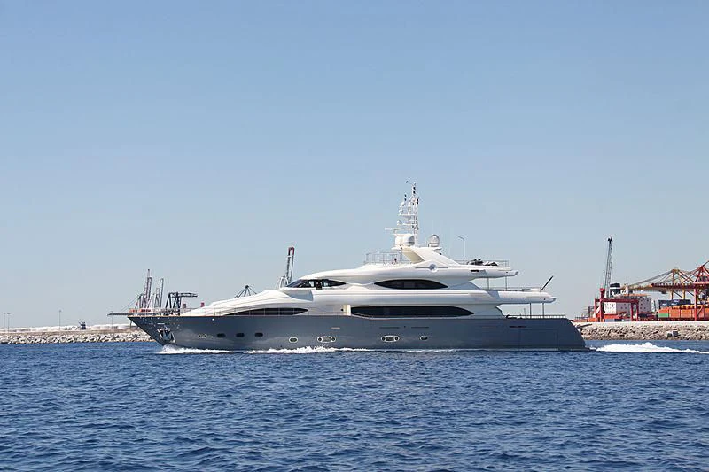 a large white yacht on the water aboard LIBERTAS Yacht for Sale