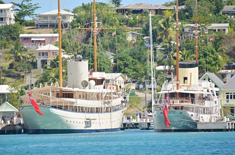 a couple of boats in the water aboard NAHLIN Yacht for Sale